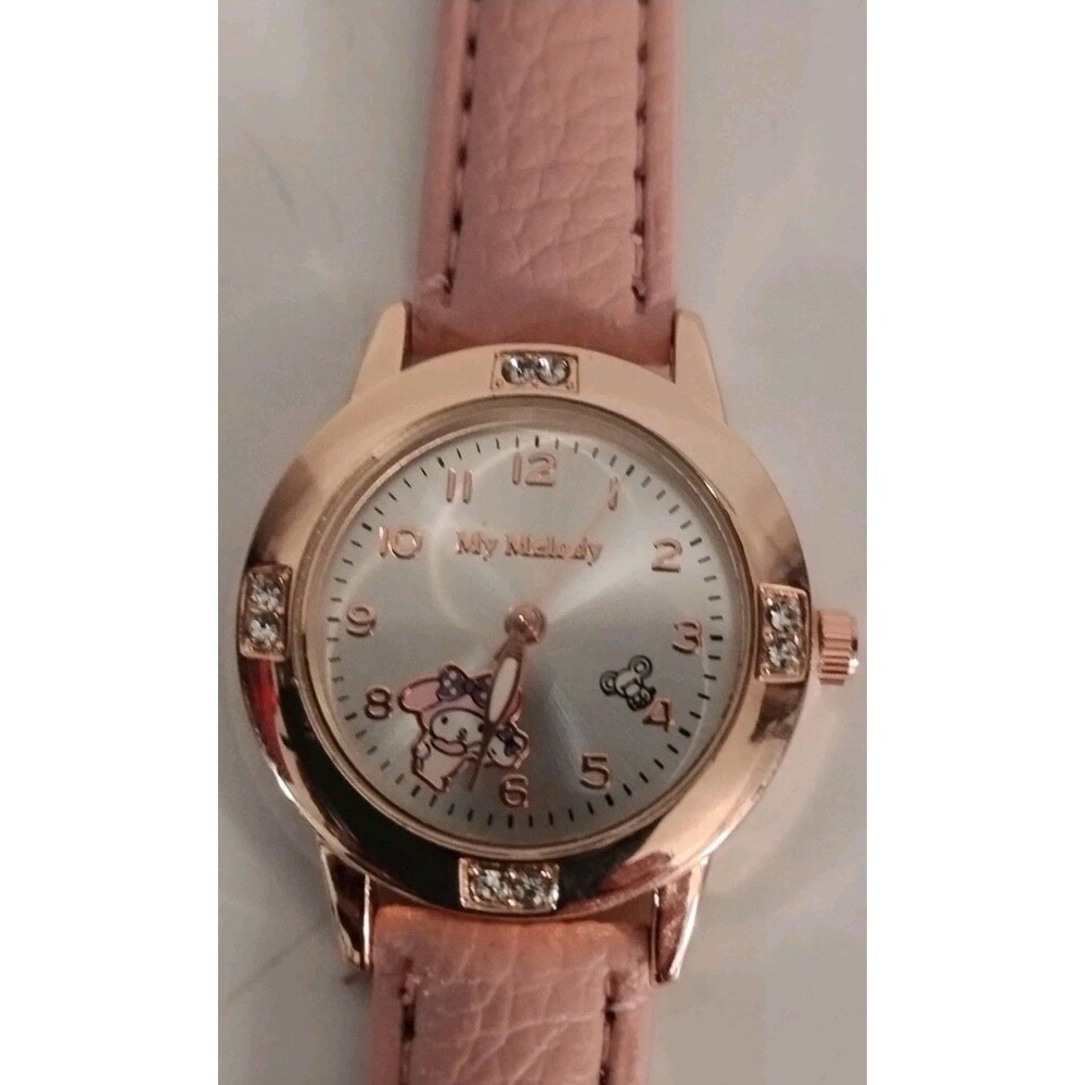 Sanrio My Melody watch features a rose gold alloy case decorated with sparkling